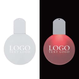 A round acrylic ornament with a white finish, featuring a logo, displayed in both white and illuminated red light.