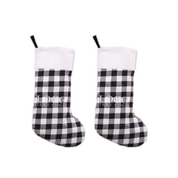Large plaid Christmas stocking ornament in black and white with a white cuff and a logo feature.