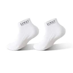 A pair of white low cut sports socks featuring a logo on the ankle section.