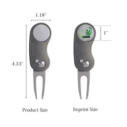 A custom ball marker repair tool in grey with a round imprint area and two prongs for functionality.