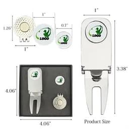A silver golf divot tool and cigar holder with a logo, accompanied by two white markers, all in a compact display.