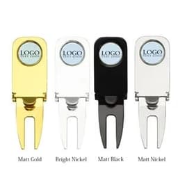 A set of four golf divot tools in matt gold, bright nickel, matt black, and matt nickel with logos.