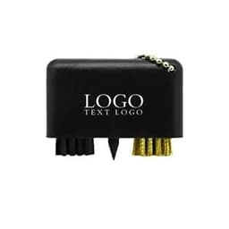 A black plastic mini golf brush keychain featuring two brushes and a tee, with a logo visible on the surface.