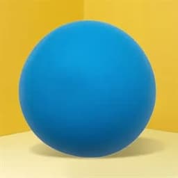 A blue stress ball sits on a yellow background. The ball is round and smooth in appearance.
