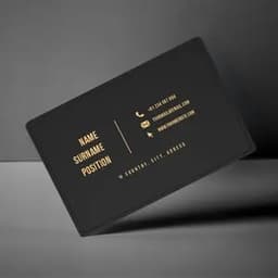 A sleek black NFC metal business card featuring gold text and a logo. Ideal for professional use.
