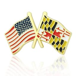 A crossed flag pin featuring the USA flag and the Maryland state flag, with gold detailing and vibrant colours.