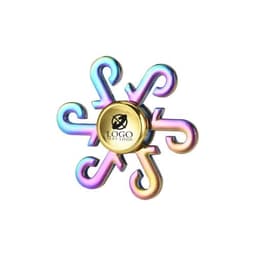 A rainbow fidget spinner toy with a gold centre and a decorative logo in the middle.