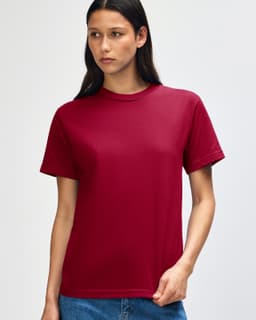 A unisex heavyweight cotton T-shirt in a rich burgundy colour, featuring short sleeves and a classic fit.