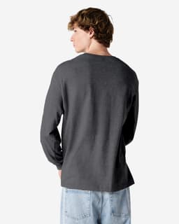 A heavyweight cotton unisex long sleeve t-shirt in dark grey, featuring a relaxed fit and plain back design.