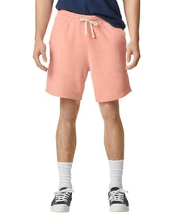 Lightweight sweatshorts in a coral hue with an elastic waistband and drawstring, featuring a logo on the side.