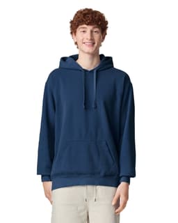 A navy adult hooded sweatshirt featuring a front pocket and a drawstring hood, worn by a smiling person.