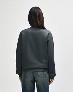 A grey Gildan Heavy Blend Adult Crewneck Sweatshirt viewed from the back, featuring a simple design and a logo.