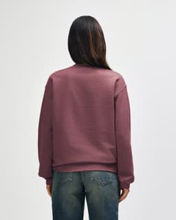 A maroon Gildan Heavy Blend adult crewneck sweatshirt, viewed from the back, featuring long sleeves and a simple design.