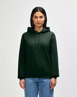 A green Gildan Heavy Blend adult hooded sweatshirt featuring a front pocket and a drawstring hood, worn by a model.