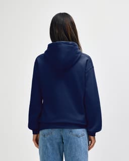 A navy blue hooded sweatshirt with a large hood, view from the back, featuring a logo on the upper back.