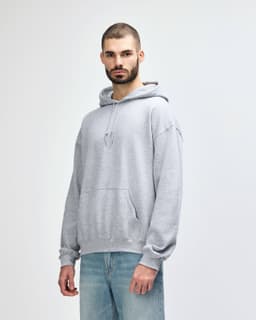A grey hooded sweatshirt with a front pocket and a drawstring hood, featuring a logo on the chest.