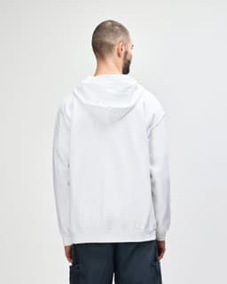 A white Gildan Heavy Blend adult full zip hooded sweatshirt viewed from the back, featuring a hood and a logo.