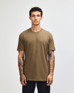 A unisex short sleeve t-shirt in a muted brown colour, featuring a simple design and a logo.
