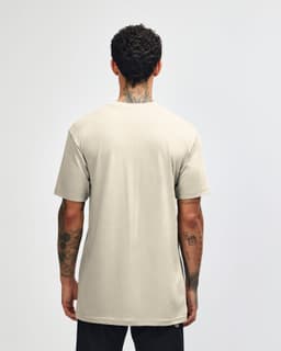 A unisex short sleeve t-shirt in a light beige colour, featuring a plain back and a logo.