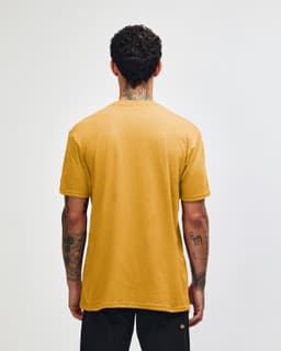 A unisex CVC short sleeve t-shirt in mustard yellow, featuring a plain back and casual fit. It has a small logo.