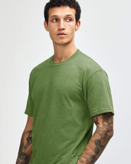 A unisex short sleeve T-shirt in olive green, featuring a simple design and no visible logos.