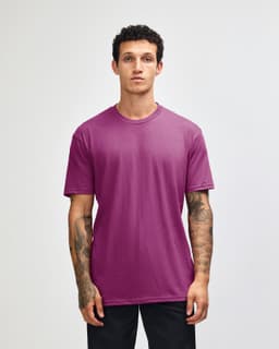 A unisex short sleeve T-shirt in vibrant pink with a simple design and a logo.