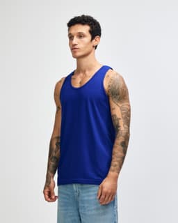 A unisex fine jersey tank in a vibrant blue colour, featuring a casual fit and a logo on the front.