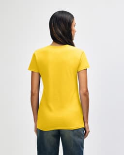 A yellow Gildan Heavy Cotton Ladies' T-Shirt is displayed from the back, featuring short sleeves and a straight cut.