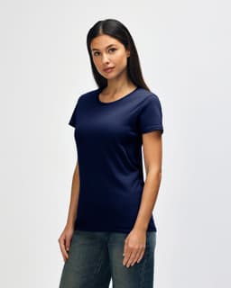 A navy Gildan Heavy Cotton Ladies' T-Shirt displayed on a model, featuring a simple design and short sleeves.