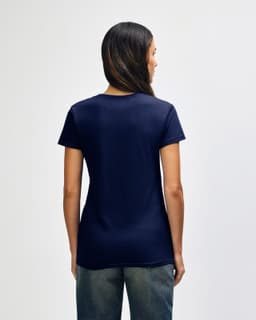 A navy Gildan Heavy Cotton Ladies' T-Shirt on a model, viewed from the back, featuring a plain design.