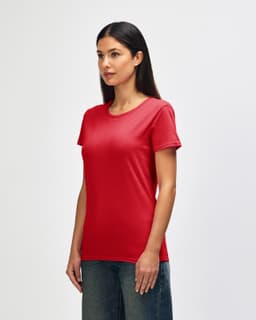 A red Gildan Heavy Cotton Ladies' T-Shirt displayed on a model, featuring a classic fit and short sleeves.