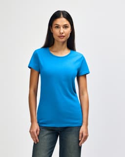 A blue Gildan Heavy Cotton Ladies' T-Shirt displayed on a model, featuring a simple design and short sleeves.