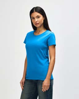 A blue Gildan Heavy Cotton Ladies' T-Shirt displayed on a model, featuring a simple design without visible logos.