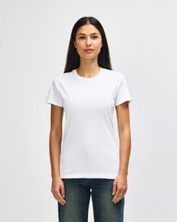 A white ladies' T-shirt made from heavy cotton, featuring a simple design and a logo. Model wearing blue jeans.
