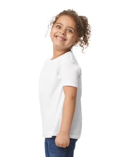 A white toddler T-shirt displayed on a child, featuring a round neck and short sleeves. The shirt has a branding logo.