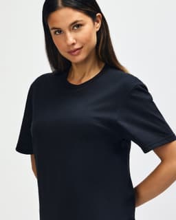 A black Gildan Softstyle adult T-shirt displayed on a male model against a neutral background.