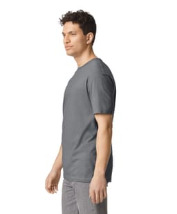 A grey Gildan Softstyle adult t-shirt displayed on a male model, featuring short sleeves and a standard fit.