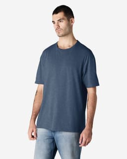 A navy adult T-shirt displayed on a male model, featuring a crew neck and short sleeves. The shirt has a logo.