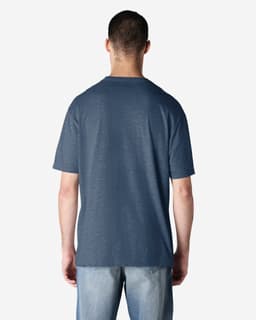 A back view of a blue Gildan Softstyle adult t-shirt, showcasing a simple design and relaxed fit.