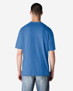 A blue Gildan Softstyle adult T-shirt viewed from the back, featuring a plain design and short sleeves.