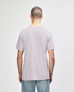 A grey Gildan Softstyle adult t-shirt is displayed, featuring a simple design and a logo on the back.