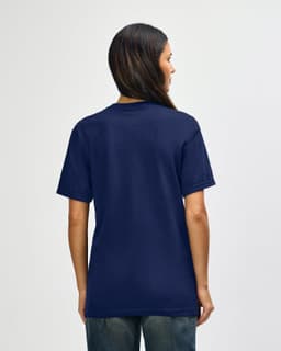 A navy blue Gildan Softstyle adult T-shirt viewed from the back, featuring a plain design and a logo.