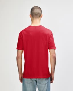 A red Gildan Softstyle adult t-shirt displayed from the back, featuring a plain design and short sleeves.