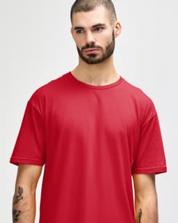 A red Gildan Softstyle Adult T-Shirt displayed on a model with a simple round neckline and a neutral expression.