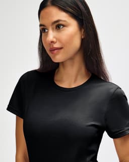 A black Gildan Softstyle ladies' t-shirt with a classic crew neck and short sleeves.