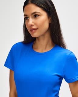A blue ladies' T-shirt featuring a round neckline and short sleeves, with a branding logo present.