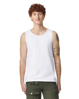 A white tank top featuring a scoop neckline and a logo on the side, modelled by a person with curly hair.