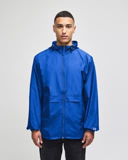 A blue full-zip anorak jacket with a hood, featuring a logo and a front pocket.