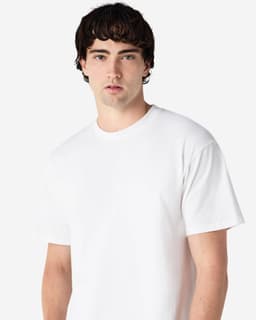 A white Gildan Hammer Adult T-Shirt displayed on a model, featuring a standard crew neck and short sleeves.