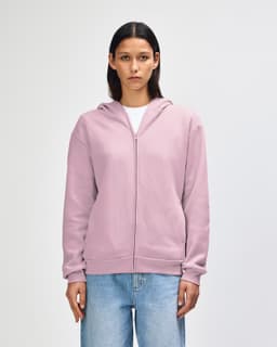 A unisex full zip hooded sweatshirt in a soft pink colour, featuring a hood and a relaxed fit.